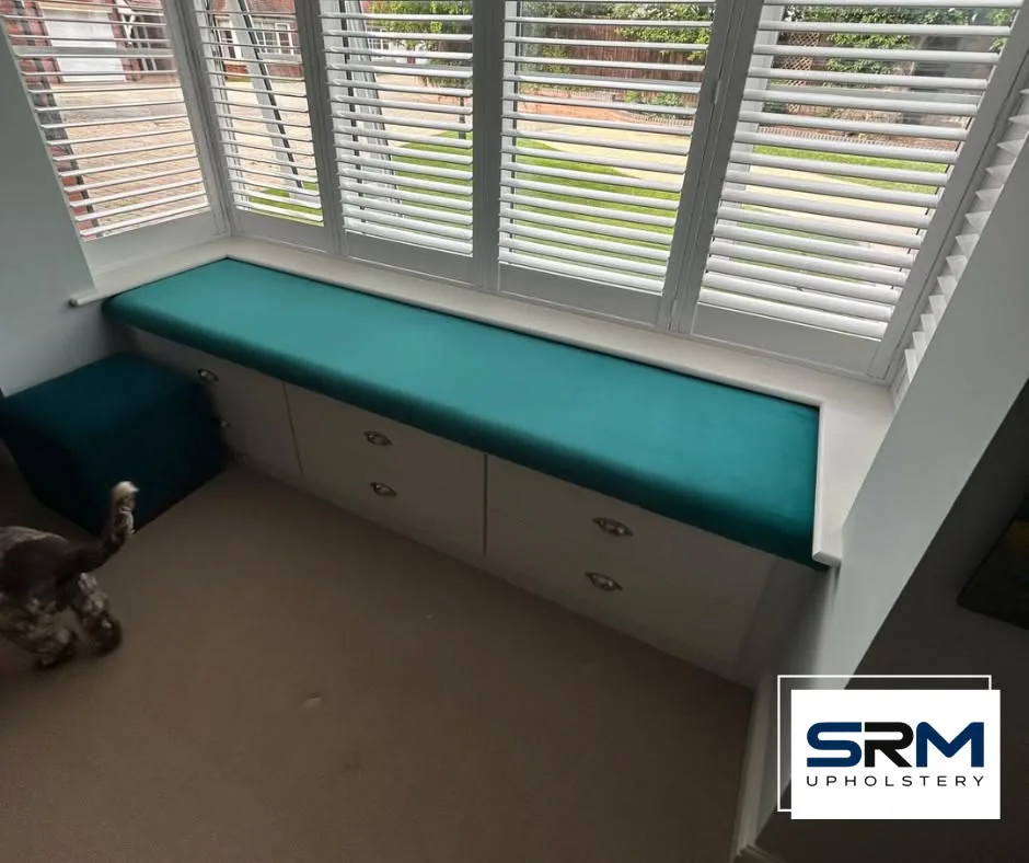 Made-to-measure teal window seat cushion and matching footstool